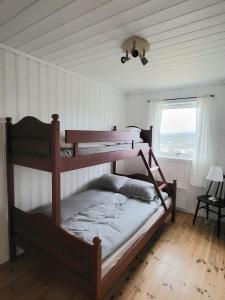 Postel nebo postele na pokoji v ubytování Stor hytte med fantastisk utsikt