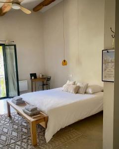 Postel nebo postele na pokoji v ubytování Felix - Maison d'hôtes