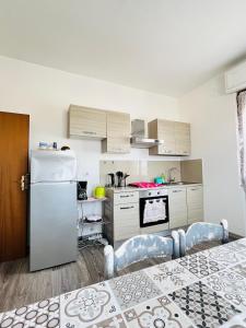 Kuchyň nebo kuchyňský kout v ubytování Casa Do Sol Apartment