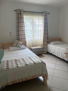 Postelja oz. postelje v sobi nastanitve Apartment Tamarinier Complexe + 26 fotografij