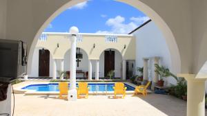 Bazén v ubytování Hotel Hacienda Margot nebo v jeho okolí
