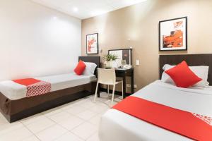 Postel nebo postele na pokoji v ubytování Orange Nest Hotel + 18 fotografií