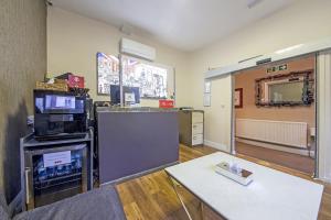 Cuina o zona de cuina de OYO 24 Sussex, London Paddington