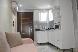 Kuchyň nebo kuchyňský kout v ubytování Appartement s1 vue mer à la marsa