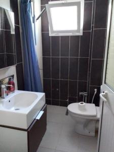 Koupelna v ubytování Appartement s1 vue mer à la marsa