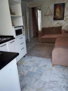 Kuchyň nebo kuchyňský kout v ubytování Appartement s1 vue mer à la marsa