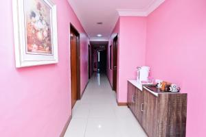 Fotografie z fotogalerie ubytování OYO 714 Arina Hotel v destinaci Bangi