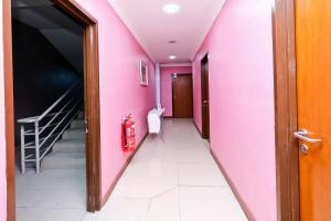 Fotografie z fotogalerie ubytování OYO 714 Arina Hotel v destinaci Bangi