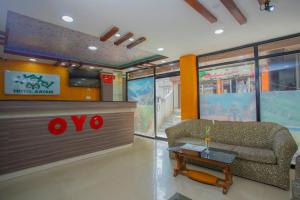 TV o dispositivi per l'intrattenimento presso OYO 297 Hotel Aayam