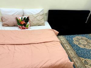 Letto o letti in una camera di BlessyWail Homestay