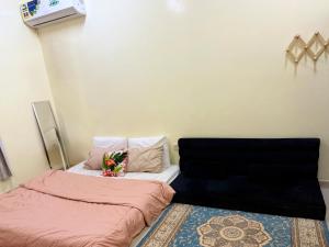 Letto o letti in una camera di BlessyWail Homestay
