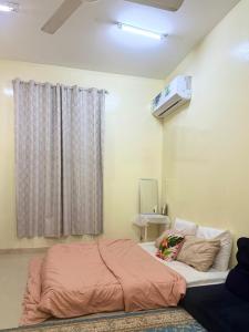 Letto o letti in una camera di BlessyWail Homestay