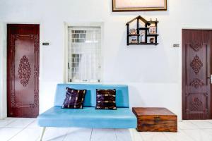 Posezení v ubytování Hotel O Jalan Jenderal Sudirman Near Imam Bonjol Square