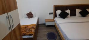Cama o camas de una habitación en Good Vibes Hotel