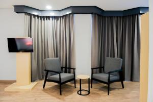 TV a/nebo společenská místnost v ubytování Super OYO Townhouse 1 Hotel Salemba