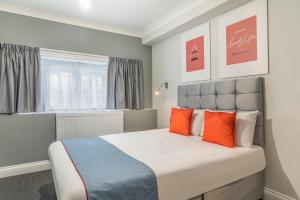 Postel nebo postele na pokoji v ubytování Townhouse Apollo, Hyde Park