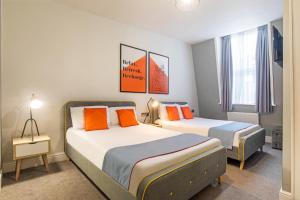 Postel nebo postele na pokoji v ubytování Townhouse Apollo, Hyde Park