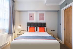 Postel nebo postele na pokoji v ubytování Townhouse Apollo, Hyde Park