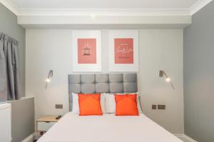 Postel nebo postele na pokoji v ubytování Townhouse Apollo, Hyde Park