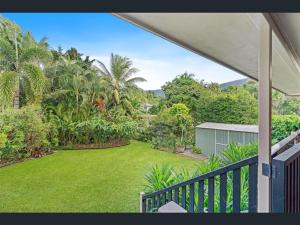 a view from the balcony of a house with a yard at Haven39 in Bayview Heights