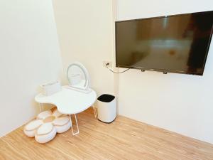 TV a/nebo společenská místnost v ubytování MuyuTime B&B
