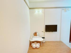 TV a/nebo společenská místnost v ubytování MuyuTime B&B