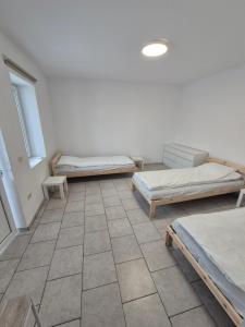 Ένα ή περισσότερα κρεβάτια σε δωμάτιο στο Casa Dana