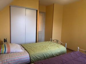 Postel nebo postele na pokoji v ubytování Gîte Argouges