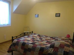 Postel nebo postele na pokoji v ubytování Gîte Argouges