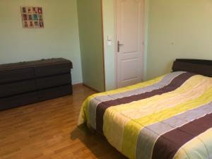Postel nebo postele na pokoji v ubytování Gîte Argouges