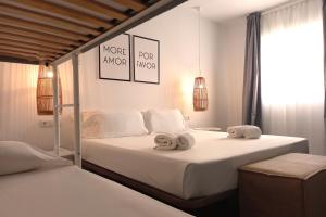 Postel nebo postele na pokoji v ubytování Hostal Boutique Bajío