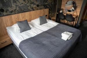 Łóżko lub łóżka w pokoju w obiekcie Lofft Hotel