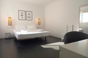 Postel nebo postele na pokoji v ubytování Hostal Boutique Bajío