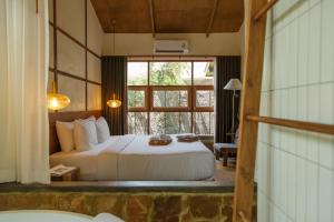 a bedroom with a bed and a large window at Mamori House at Kohlarn in Ko Larn +87 photos