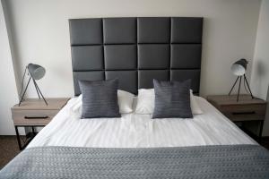 Łóżko lub łóżka w pokoju w obiekcie Lofft Hotel