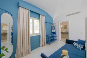 Postel nebo postele na pokoji v ubytování Infinity Suites