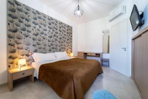 Postel nebo postele na pokoji v ubytování RESIDENCE ARCHIMEDE