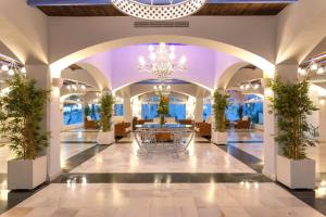 a lobby of a hotel with a chandelier at Casa Marbella Vime Resort Gym Spa Pools in Marbella +54 photos