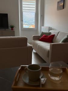 Χώρος καθιστικού στο La Finestra Sul Garda DREAMING HOLIDAYS