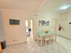 TV a/nebo společenská místnost v ubytování Cortile Maggiore Home