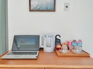 Photo de la galerie de l'établissement Blue Star Viên Hotel, à Binh Tien