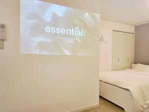 Cama ou camas em um quarto em 편의점까지10초걸리는아늑한아파트 신주쿠2분 역5분 16평 최대4명 부엌침실 장기체류환영