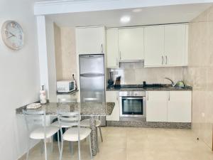 Kuchyň nebo kuchyňský kout v ubytování Apartamento TIERRA