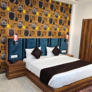 Postel nebo postele na pokoji v ubytování Hotel Agra Hotel Grand View