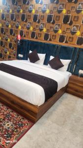Postel nebo postele na pokoji v ubytování Hotel Agra Hotel Grand View