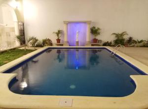 Bazén v ubytování Hotel Hacienda Margot nebo v jeho okolí