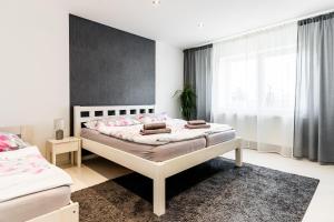 Postel nebo postele na pokoji v ubytování Ubytování U Jany