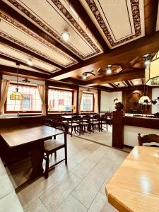 a large dining room with a table and chairs at Gasthaus Grafenstuben in Sankt Martin +21 photos