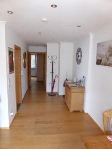 a hallway of a home with a hard wood floor at Stürmlesloch in Bad Wildbad +13 photos