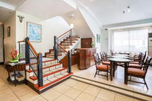 Posezení v ubytování OYO 210 Apple Tree Suites